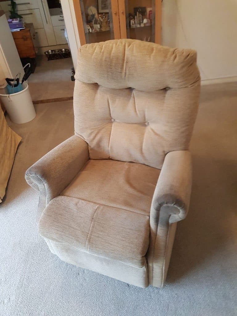 A recliner chair in a living room.